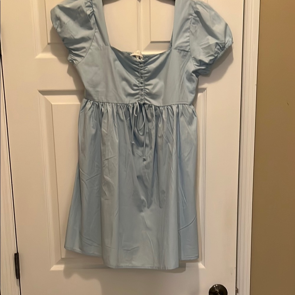 Light Blue Juniors dress with raushed front and puff sleeves SZ M